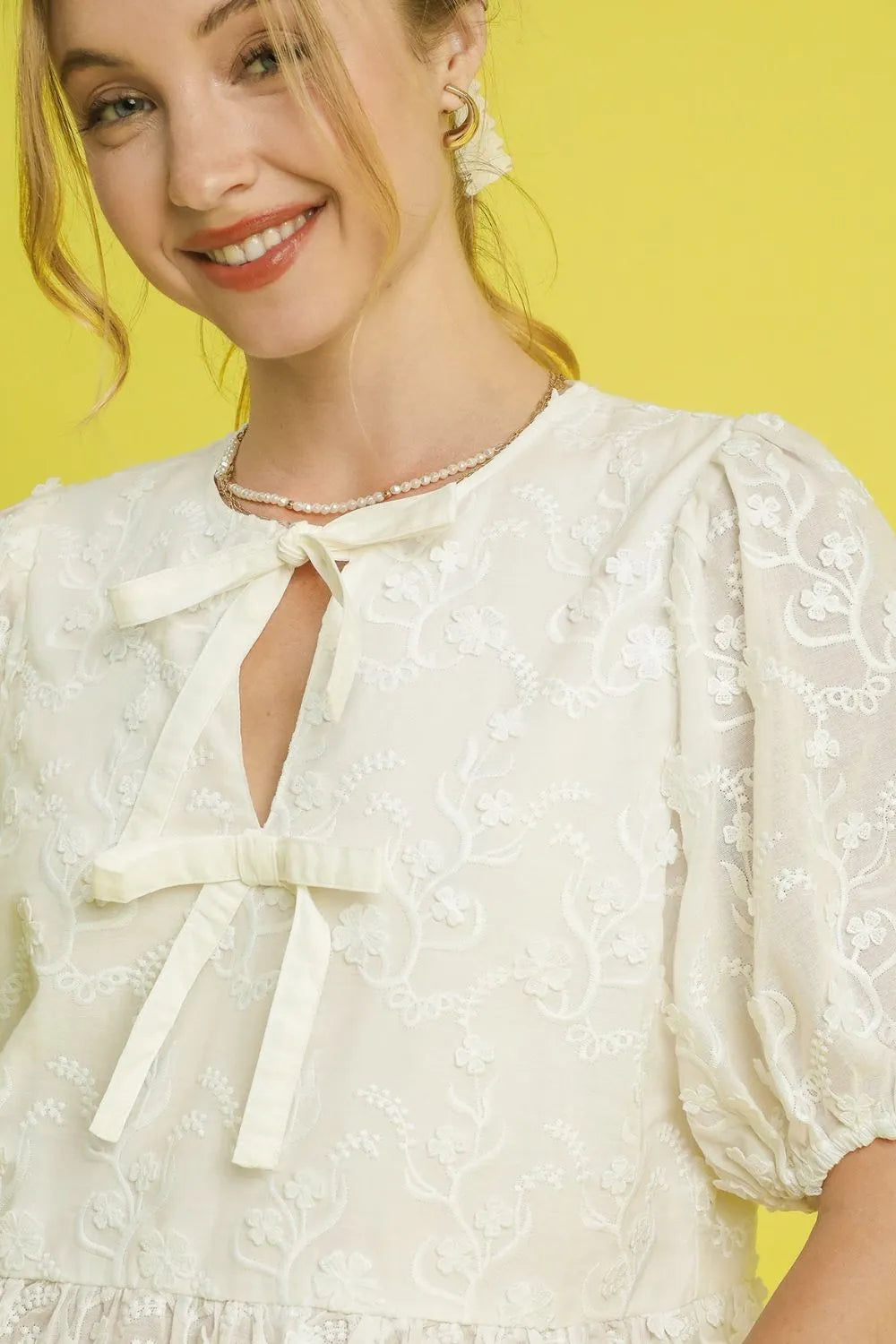 Umgee Blouse Cream Embroidered Bow Tie Front Neck Peplum Short Sleeve Top 0554e66d-f771-4848-a722-7e45e94d030c-Max-Origin Trendsi