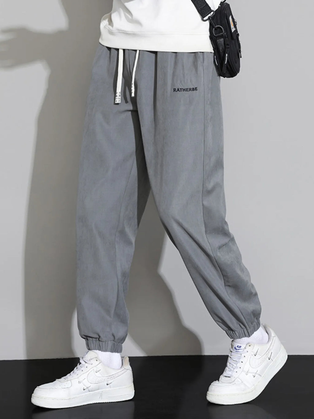 Men's Joggers Drawstring Waist with Side Pockets Pants 062d5e16086d4a248b78dd39180f3b3e-Max-Origin Trendsi