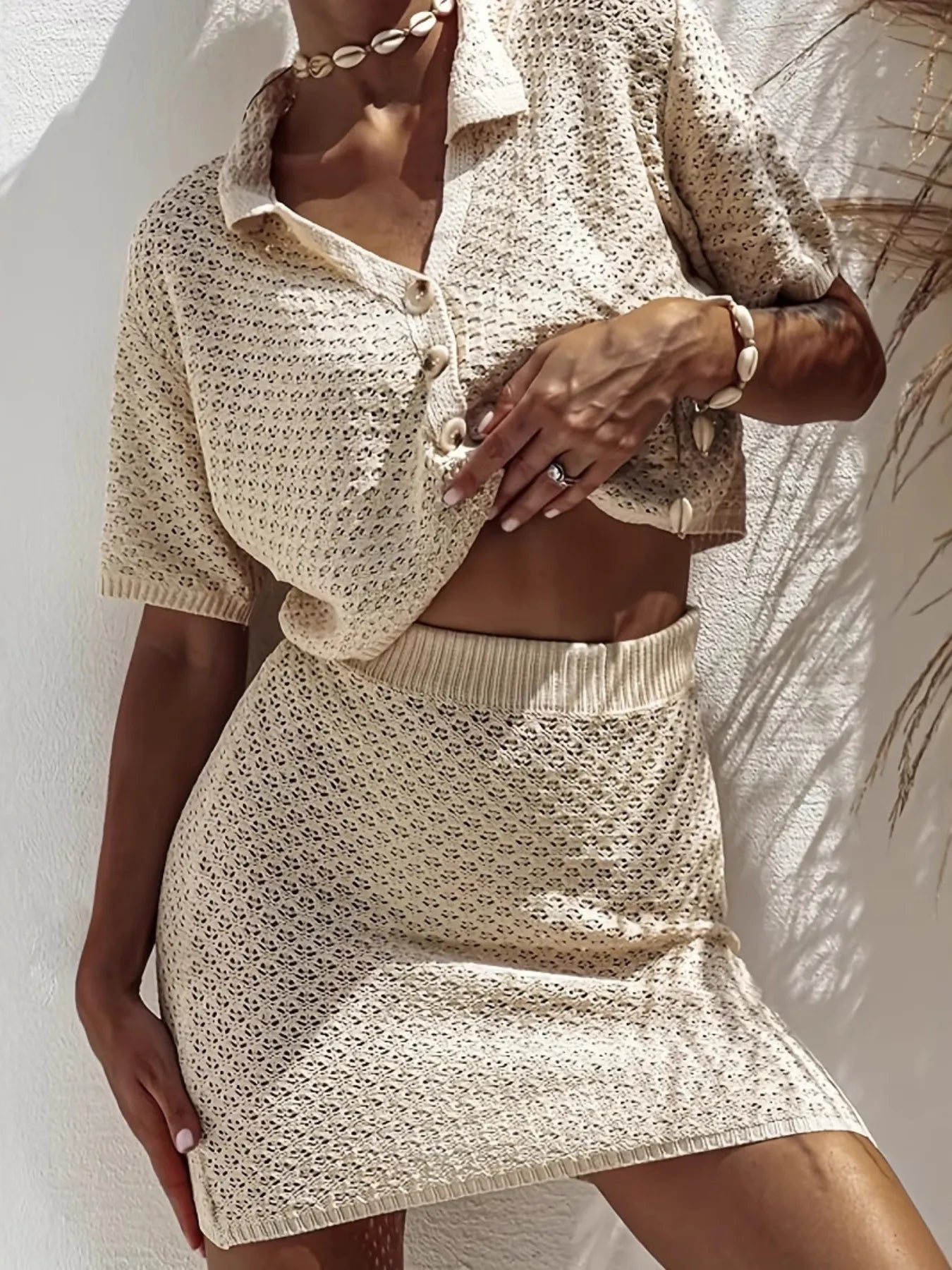 Women's Sweater Set Openwork Knit Button Up Short Sleeve Top and Mini Skirt Apricot 08740f1a45b74039b060b7526a99788f-Max-Origin Trendsi