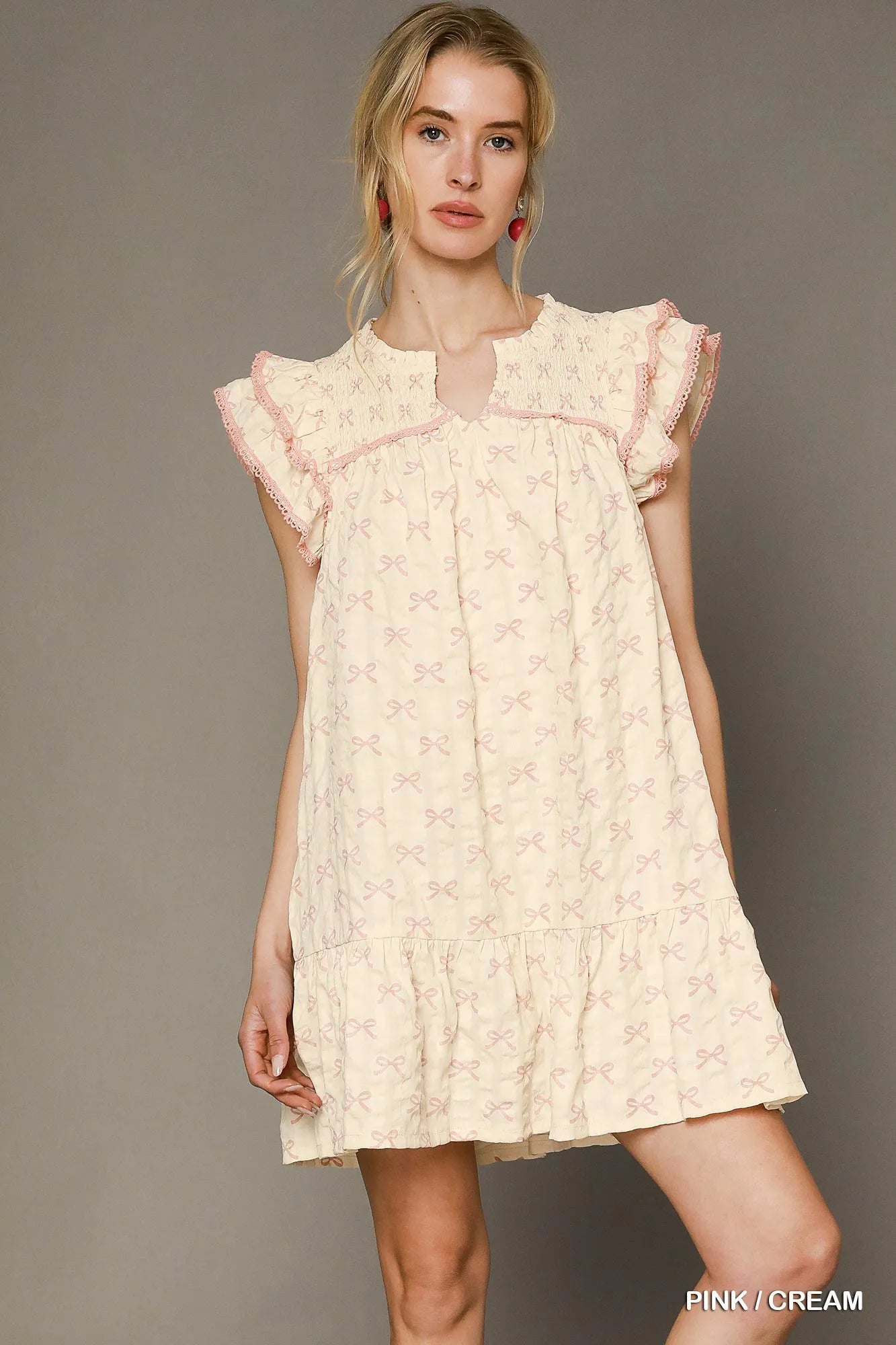 Umgee Mini Dress Pink Cream Bow Print Ruffled Cap Short Sleeve Ruffled 0cf03e01-54eb-46d7-a90c-f8c50c016306-Max-Origin Trendsi