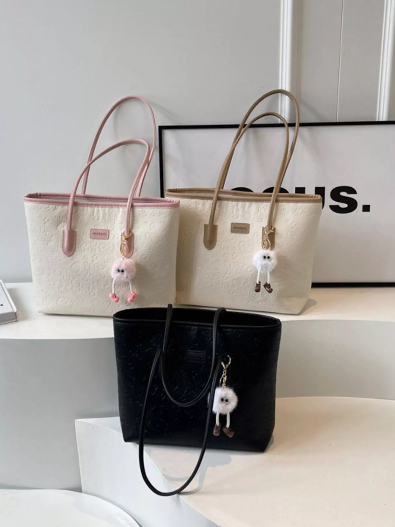 Womens Tote Bag Embossed Pattern Letter Stylish and Functional Handbag 0cfcc84d-9719-42a4-bf89-48e60ec60e64-Max-Origin Trendsi