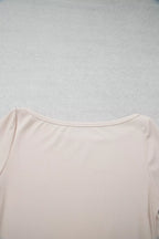 Rear upper bodice view highlighting smooth boat neck curve and shoulder seams