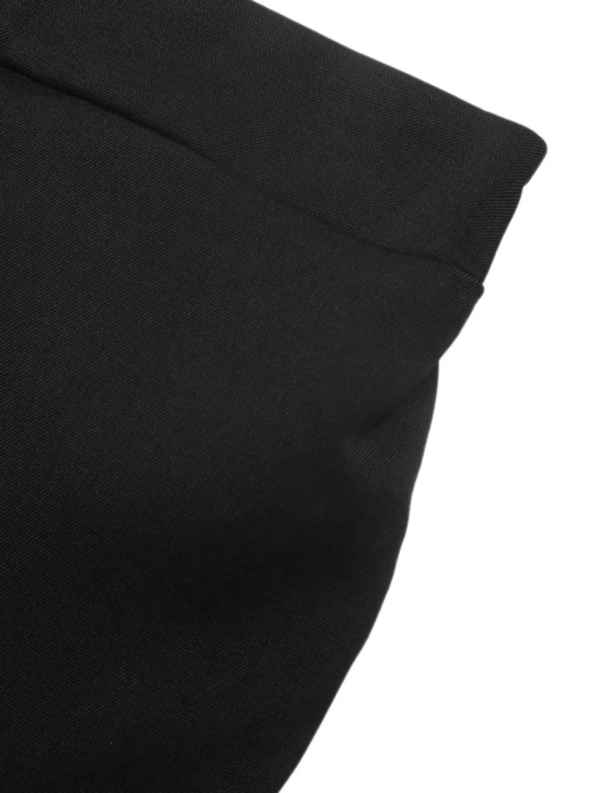 Macro shot highlighting textured black material with clean pressed edge and drape