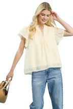Umgee Flutter Sleeve Relaxed Fit Top with Pom-Pom Trim Detail in Cream