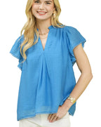 Umgee Flutter Sleeve Relaxed Top with Decorative Pom-Pom Trim