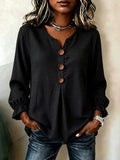 Blusa de punto texturizada negra con mangas fruncidas y ajuste relajado
