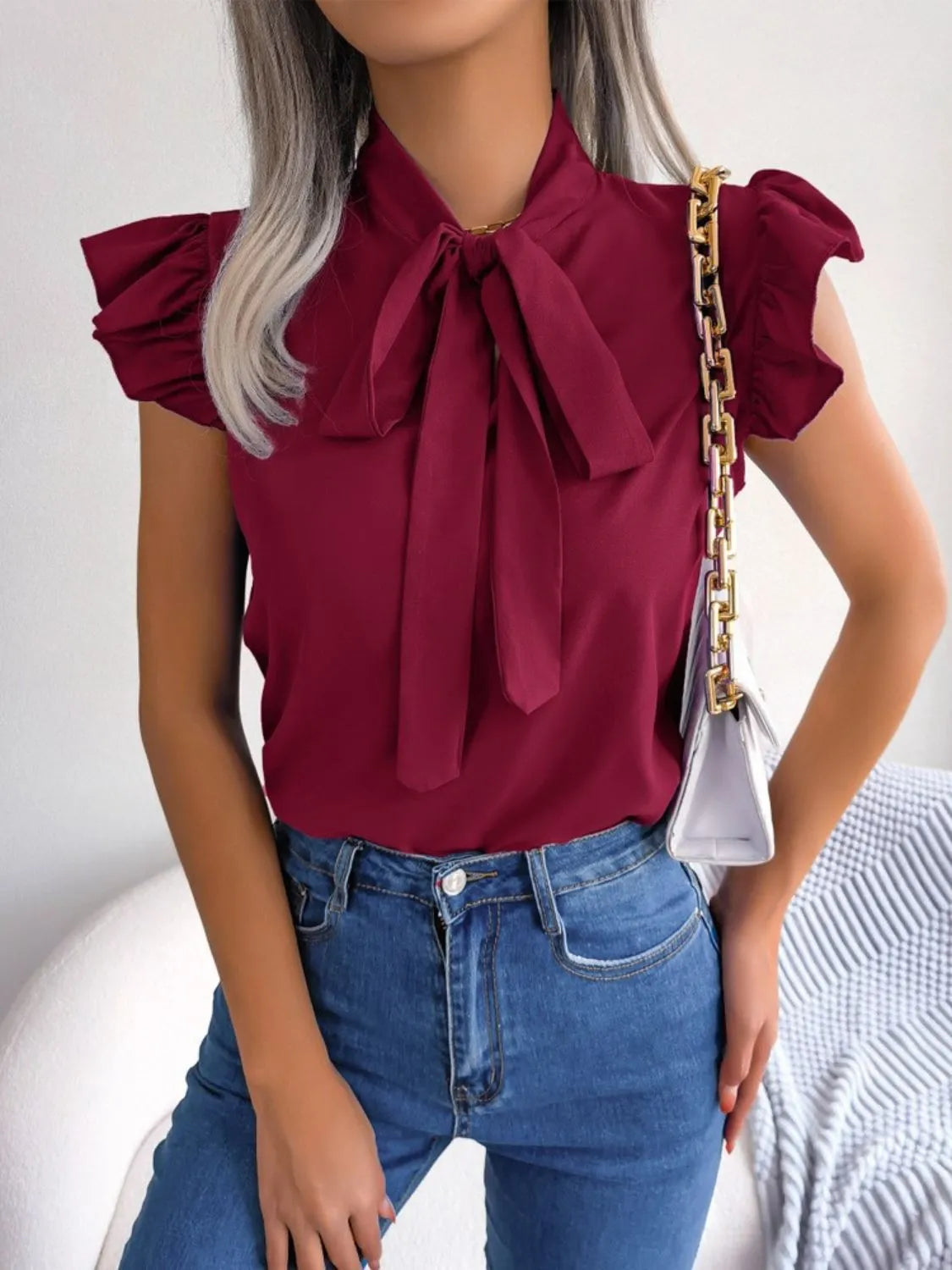 Women's Blouse Bow Tie Neck Ruffle Cap Short Sleeve Top 22f0f0e4-b4ce-46fb-9824-c982598fa580-Max-Origin Trendsi