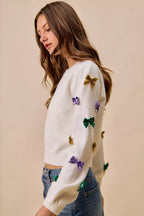 SO ME Sweater Knit Top Mardi Gras Glitter Bow Ribbon Ivory 27d73ea465434f5a9b258dd367a8cda8-Max-Origin Trendsi