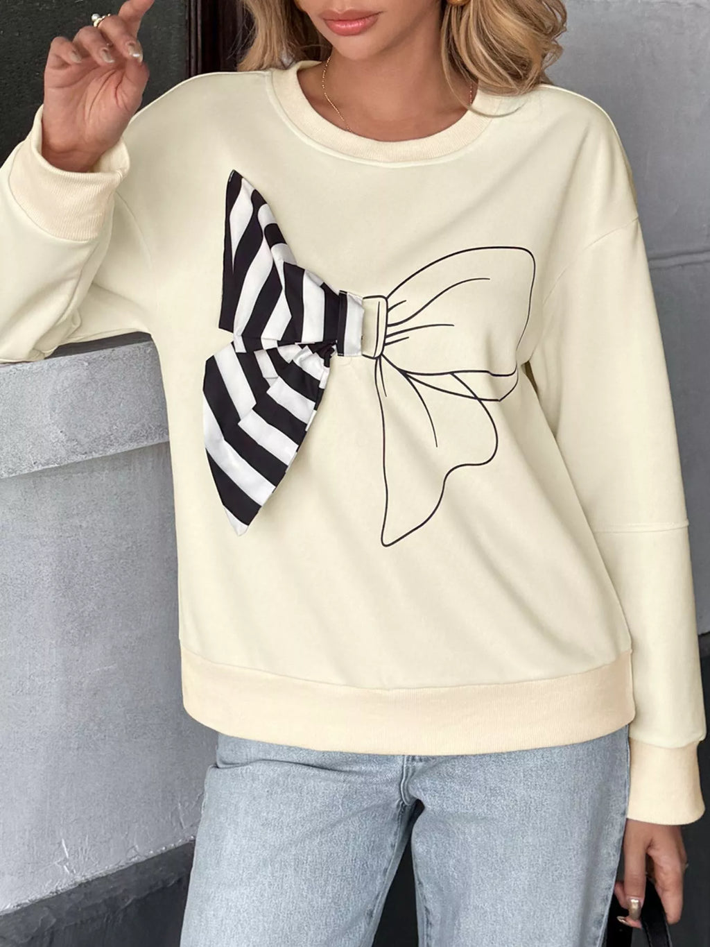 Women's Sweatshirt Beige Bow Round Neck Dropped Shoulder Long Sleeve 2ab763fe-656a-41ac-ab7a-97f46ab0c382-Max-Origin Trendsi