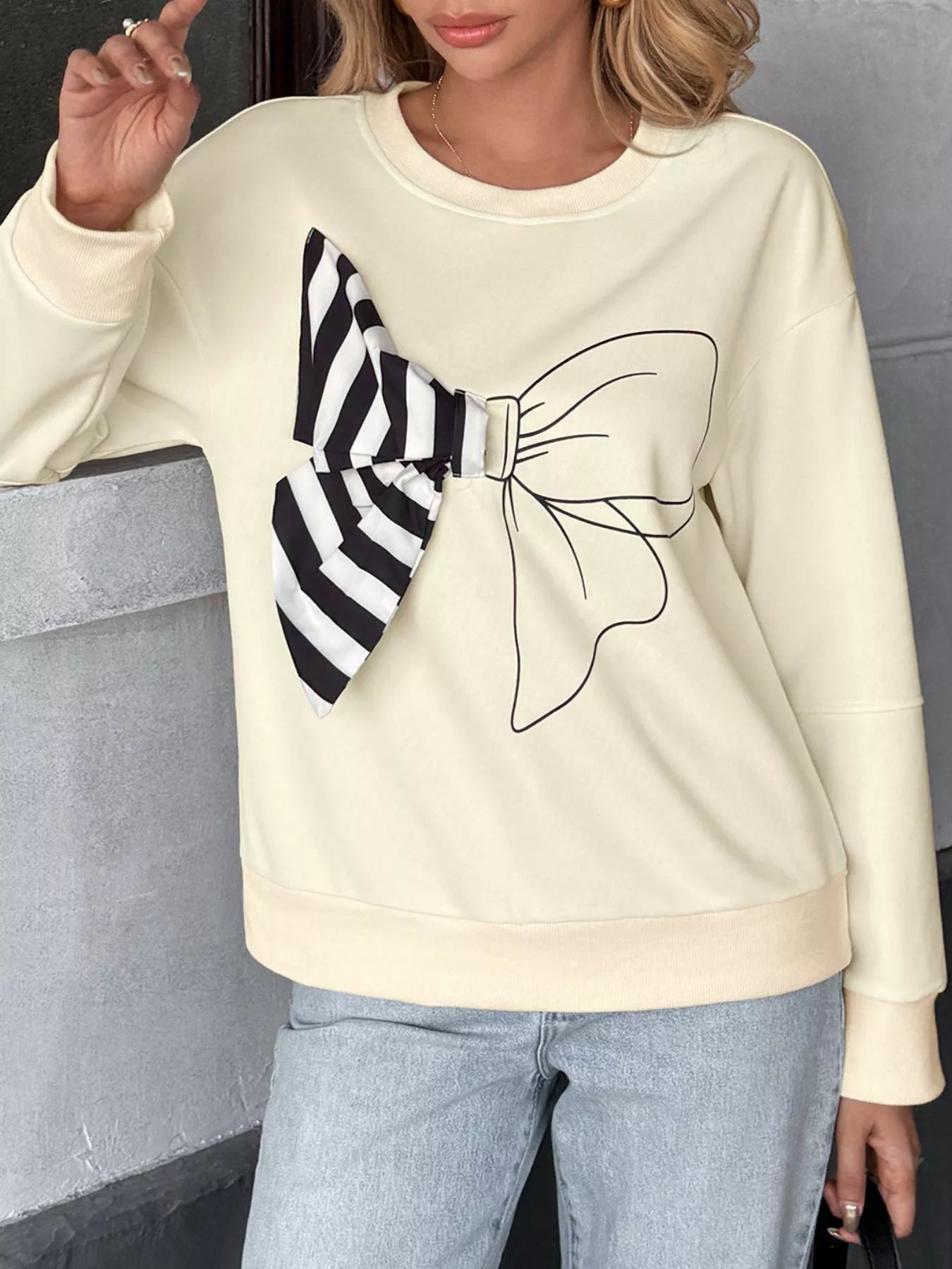 Women's Sweatshirt Beige Bow Round Neck Dropped Shoulder Long Sleeve 2ab763fe-656a-41ac-ab7a-97f46ab0c382-Max-Origin Trendsi