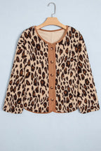 Leopard print jacket on wooden hanger featuring round neckline with brown corduroy trim and five buttons