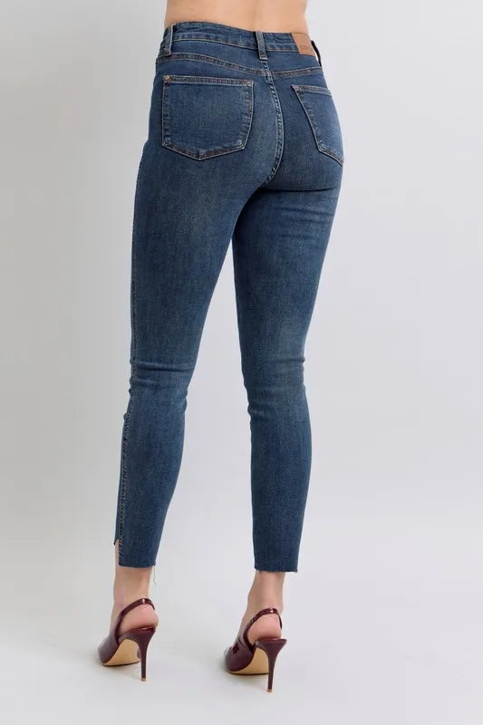 Judy Blue Skinny Jeans High Waist Raw Hem Side Slit Dark Wash 312531c56ab64a0b87ef9f4301951683-Max-Origin Trendsi