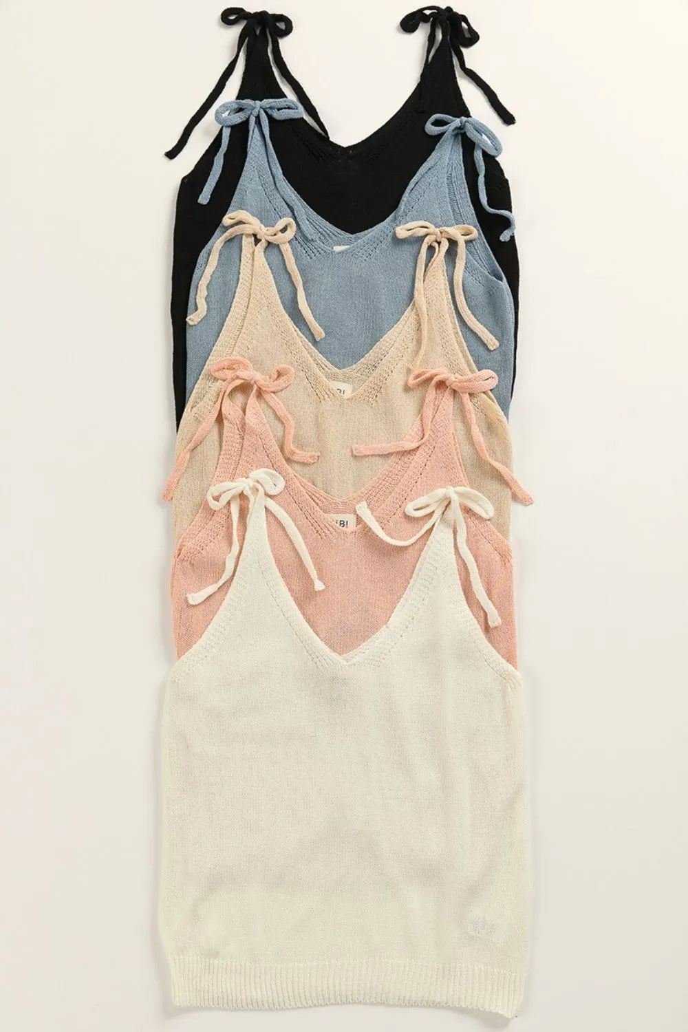 BiBi Knit Top Bow Tied Shoulder Starps Solid Off White Cami Blouse 32db40a6-b36e-4932-b4a5-e0ac3df7ff4f-Max-Origin Trendsi