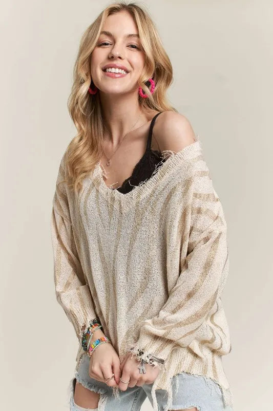 ADORA Knit Top Distressed Zebra Ivory Gold Raw Hem Fringe Long Sleeve 34c1fc57c54448bc8f6f7346ed6e4db3-Max-Origin Trendsi