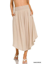 Zenana Midi Skirt High-Low Woven Crinkle Smocked Waist Sand Beige With Pockets SAND BEIGE 3ac3bfd0-b905-41b6-8f0e-576804449dff-Max-Origin Trendsi