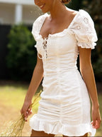 Crochet Mini Dress Cotton White Eyelet Ruffled Hem Lace Up Tied Neck 3c501f620d9f4d559c95be9e46a269b5-Max-Origin Trendsi
