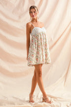 SO ME Mini Cami Dress Cotton Floral Mixed Print Sleeveless Smocked Ruffled 3f9e6928e4c34c78aa15fd5dea157e38-Max-Origin Trendsi