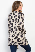 Back view of long animal print knit cardigan draping below hips with continuous bold pattern on soft fabric