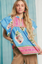 Umgee Blouse Sky Blue Floral Notched Puff Short Sleeve Top 55fbb69e-b315-49ea-8a14-ecc133dca4b8-Max-Origin Trendsi