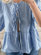 Blouse Front Tied Round Neck Long Sleeve Cotton Blend Tops 5717439d-b27d-4169-ad6b-3340fa998f05-Max_392c9ff7-4210-462b-a688-395c41eea99f Trendsi