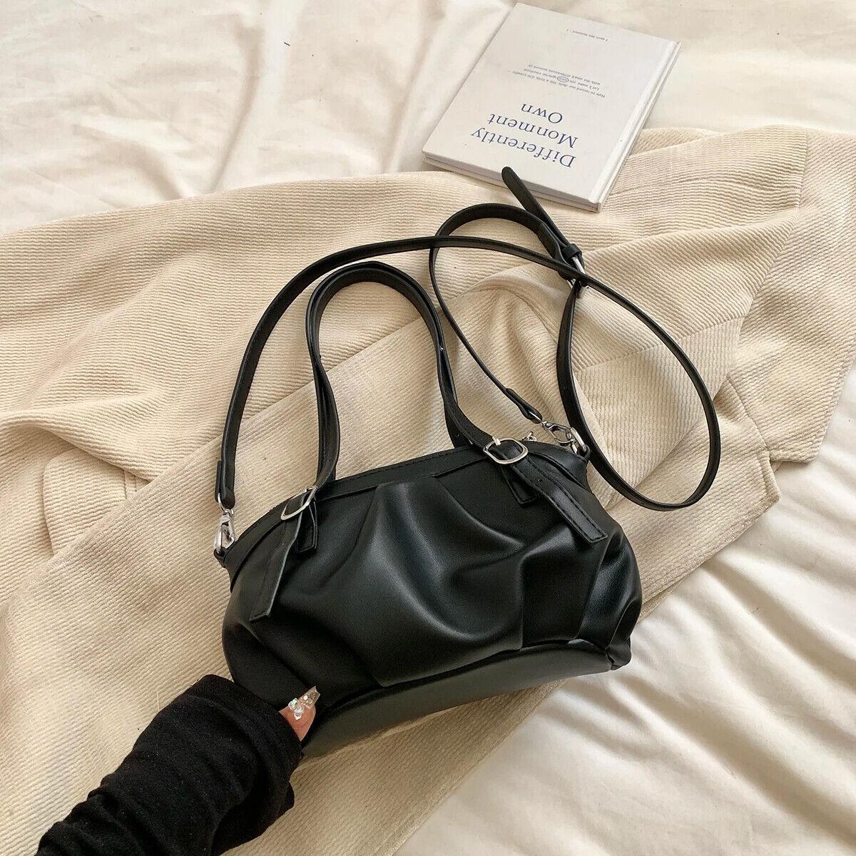 Small Buckets Bags Leather Pleated Belt Buckle Women Soft Zipper Handbags 57_17ac6d86-56a0-4a5f-9755-87b32f4accbe STYLEINGER