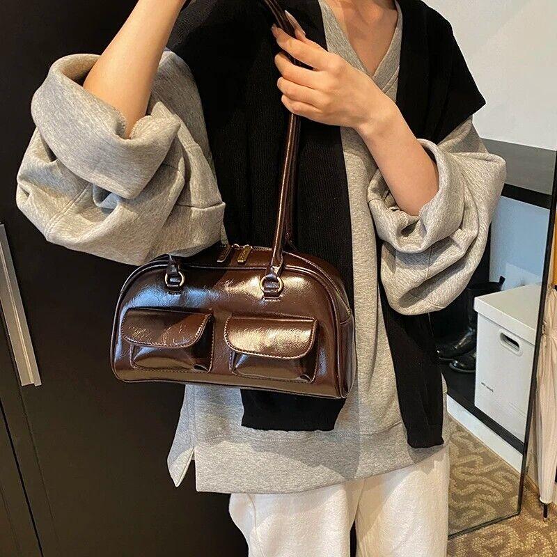 Medium Shoulder Bag Rope Ball Tassel Accessories Women Zipper Outer Flap Pockets 57_206eff72-dcbc-4c73-98ce-ba96aee8a480 STYLEINGER