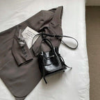 Mini Leather Bucket Bags Soft 2 in 1 Removable Pouch Drawstring Snap Crossbody Black 57_424e651a-f1a4-48fe-8c5e-8a52466aac86 STYLEINGER