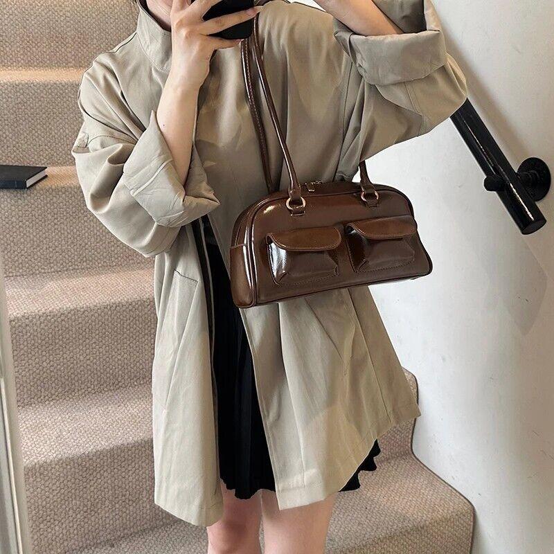 Medium Shoulder Bag Rope Ball Tassel Accessories Women Zipper Outer Flap Pockets 57_66372798-4ea0-4a0a-8a74-5ec6762464ef STYLEINGER