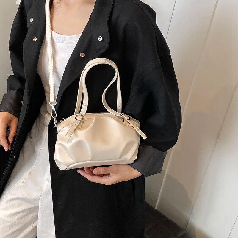 Small Buckets Bags Leather Pleated Belt Buckle Women Soft Zipper Handbags 57_8b08f497-ddbf-4fd9-b4cd-2e65843e2432 STYLEINGER