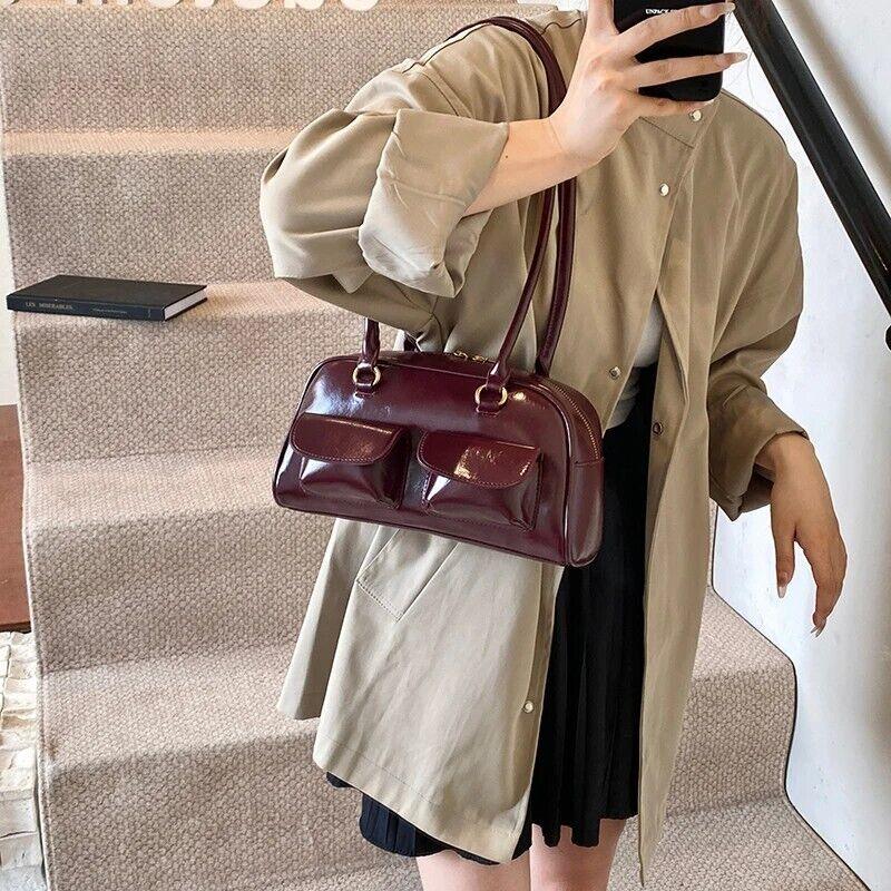 Medium Shoulder Bag Rope Ball Tassel Accessories Women Zipper Outer Flap Pockets 57_94032505-cf20-4bca-80f8-aa3fa4ad3592 STYLEINGER