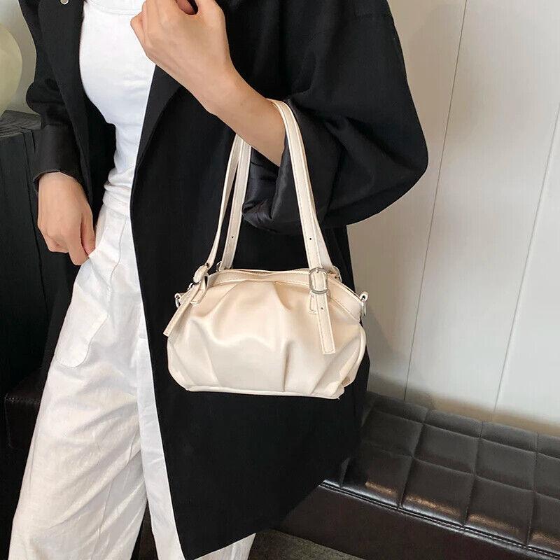 Small Buckets Bags Leather Pleated Belt Buckle Women Soft Zipper Handbags 57_d1db6dbe-0ce2-4bc7-8933-8145c0ea3931 STYLEINGER