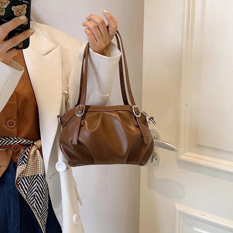 Small Buckets Bags Leather Pleated Belt Buckle Women Soft Zipper Handbags 57_eff1ae2e-da4a-4405-b6fe-6f5eebc1d011 STYLEINGER