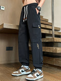 Men's Cargo Pants Casual with Drawstring Waist Plus Sizes Black 5b627099476f4b01ad49c18c6644a0e6-Max-Origin Trendsi