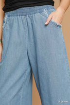 Umgee Womens Wide Leg Jeans Light Blue Washed Fringe Hem Denim Pnats 61e309c0-a560-4135-9424-dff0f010d428-Max-Origin Trendsi