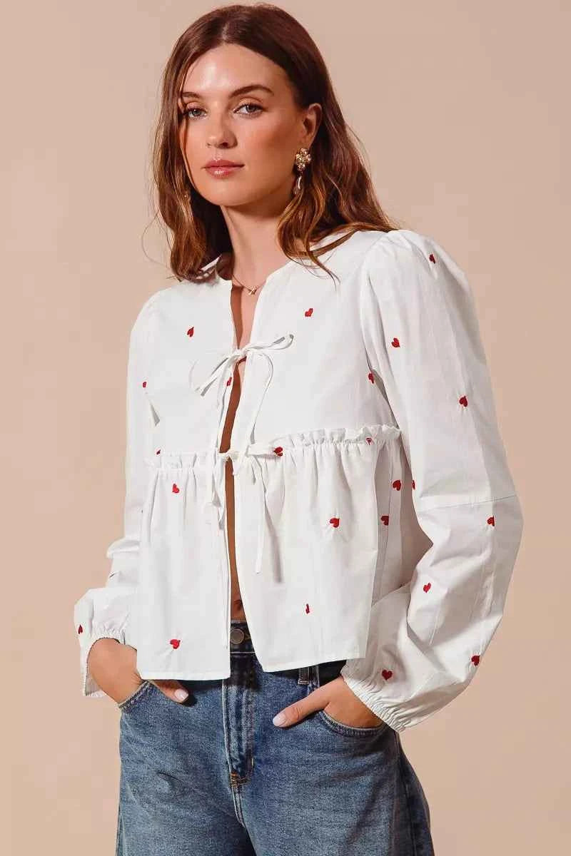SO ME Women Blouse Front Tie Heart Embroidered Top With Puff Long Sleeve 684b93aaa8f74277b746f6fdcf80bd21-Max-Origin Trendsi