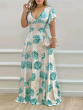 Plus Size Floral Print V-Neck Maxi Dress with Tiered Ruffles and Flutter Sleeves