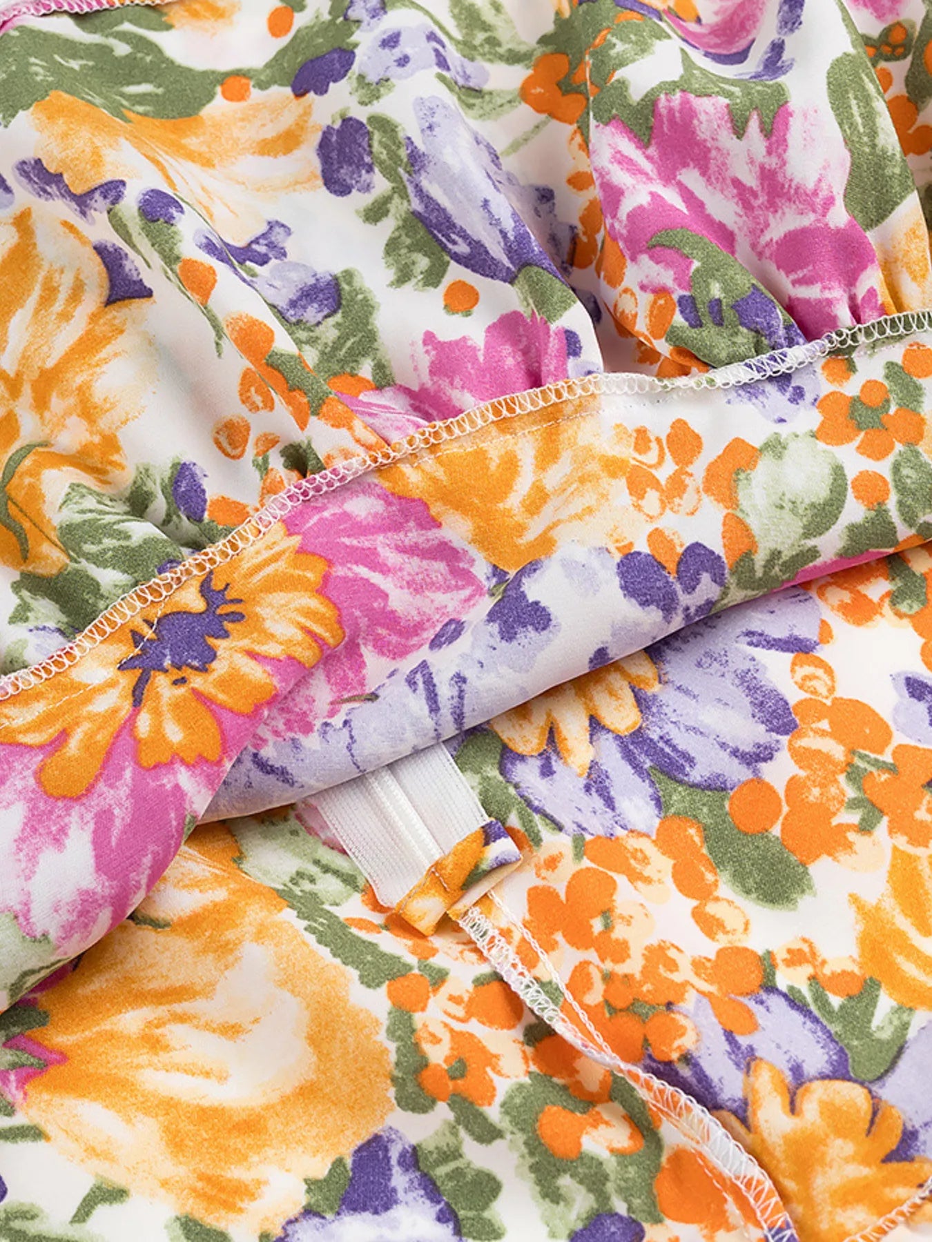 Floral Mini Dress Colorful Print Ruffled Hem Cutout Bow Tied Backless 6c187a42e7ae4afd9b523bd4ea584e3d-Max-Origin Trendsi