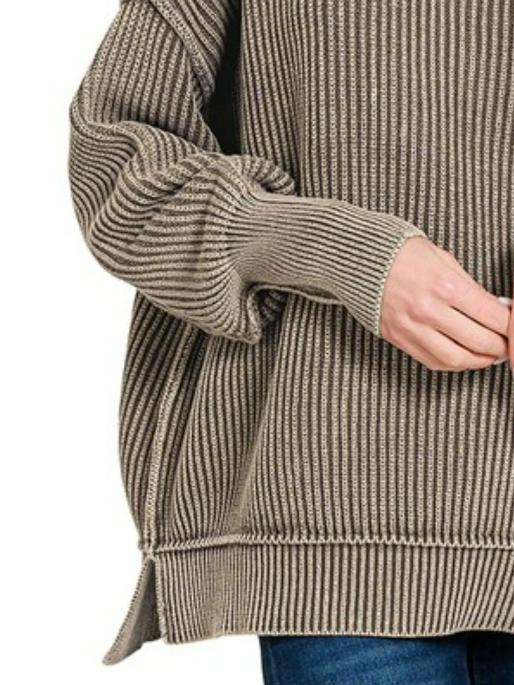 Close-up of mocha washed cotton sweater showing vertical ribbed texture, elastic cuff, and side slit hem detail