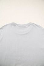 Top-down close-up of back neckline showing standard ribbed crew neck collar and smooth, solid light grey fabric texture
