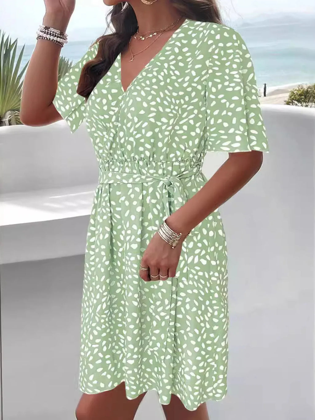 Mini Dress Printed Surplice Tie Waist Dress Belted V Neck Short Sleeve 71a602be5b07439ba823884f943f8f7a-Max-Origin Trendsi