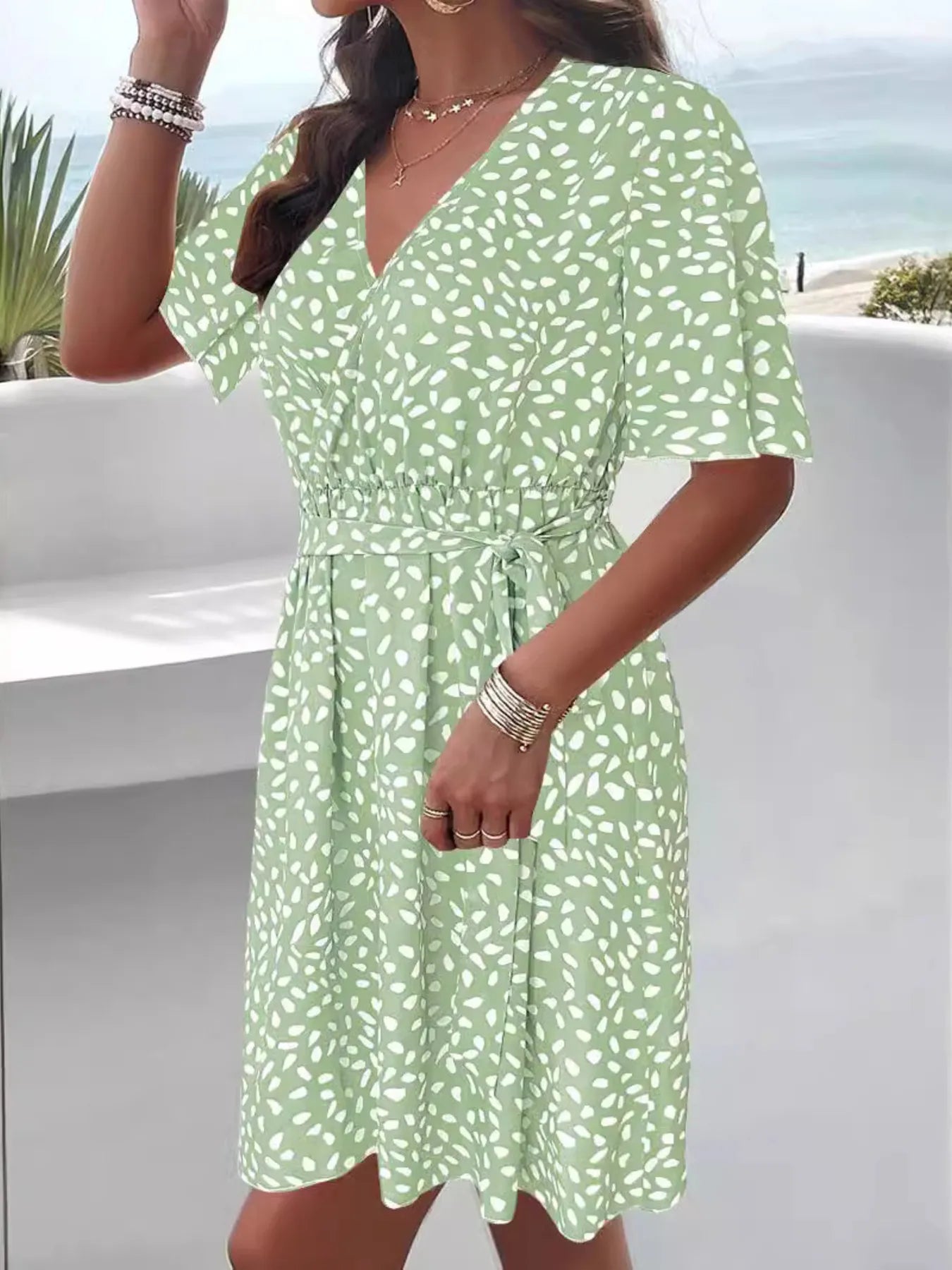 Mini Dress Printed Surplice Tie Waist Dress Belted V Neck Short Sleeve 71a602be5b07439ba823884f943f8f7a-Max-Origin Trendsi