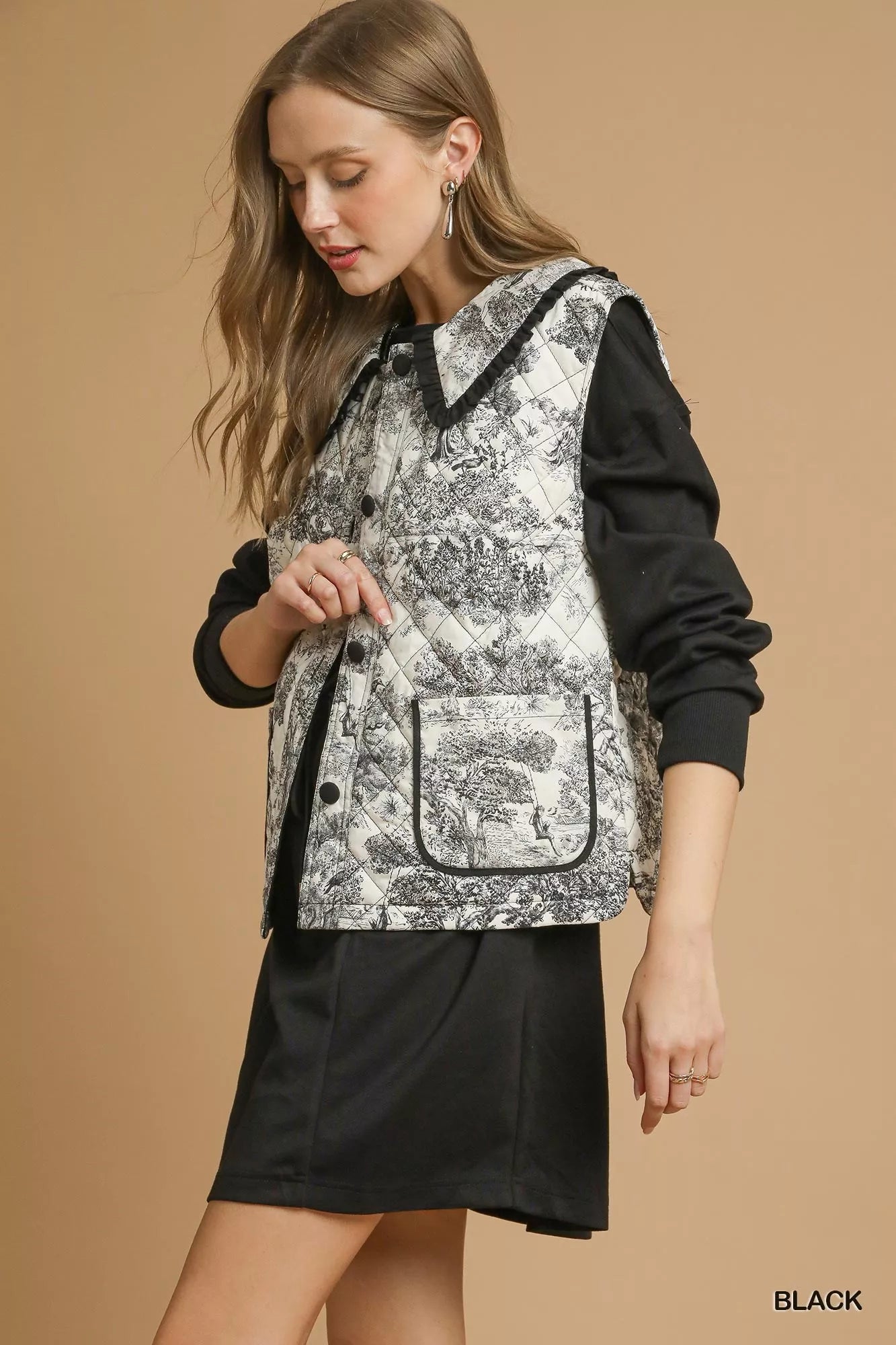 Umgee Womens Quilted Vest Black Toile with Ruffle Collar Outwear 71a65a01-deb9-4505-89fa-b24a89636f59-Max-Origin Trendsi