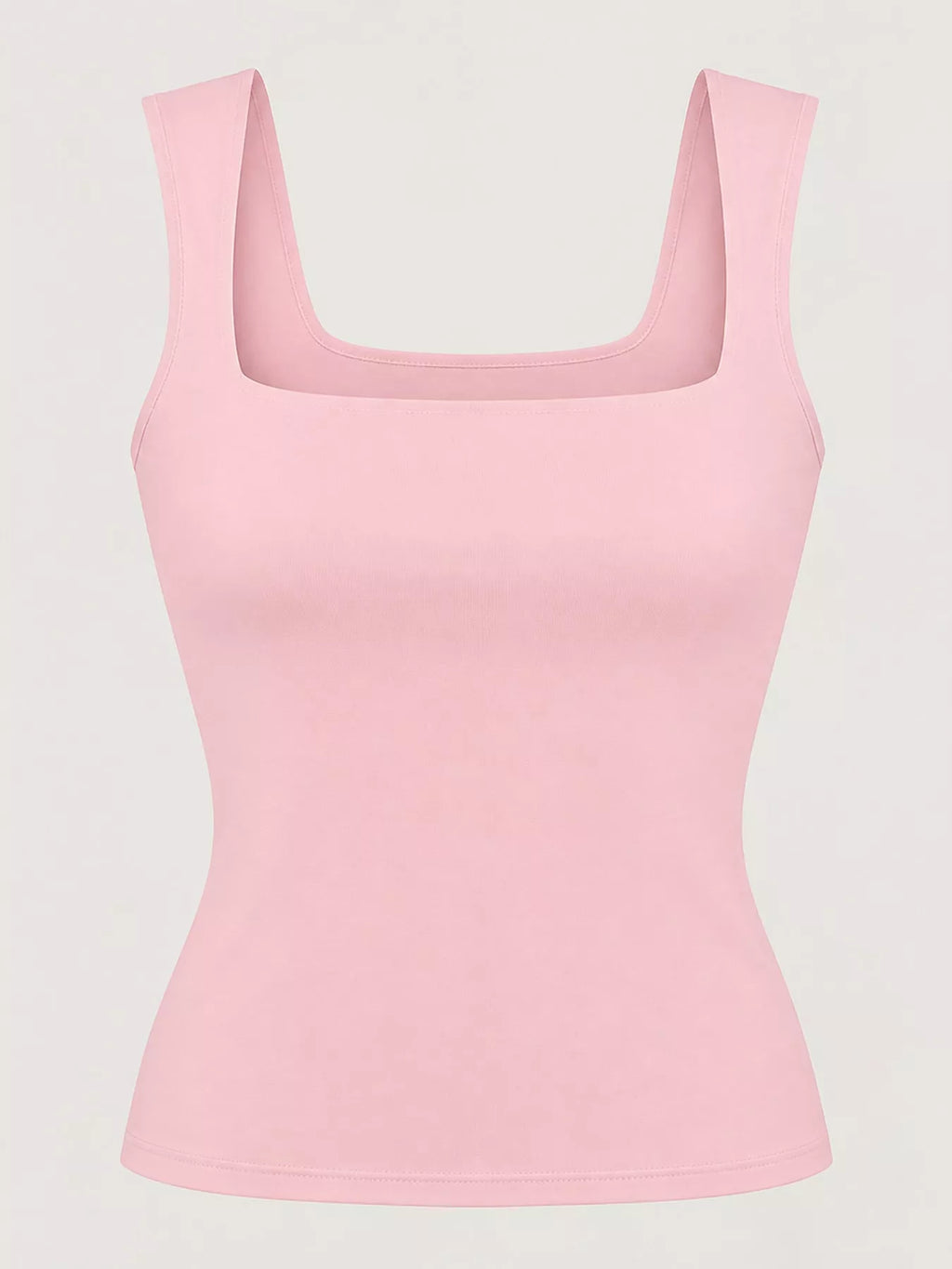 Foto de estudio de tank rosa claro en maniquí enfatizando cuello estructurado