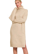 Beige ribbed knit midi sweater dress with turtleneck, long sleeves, and front slit on model