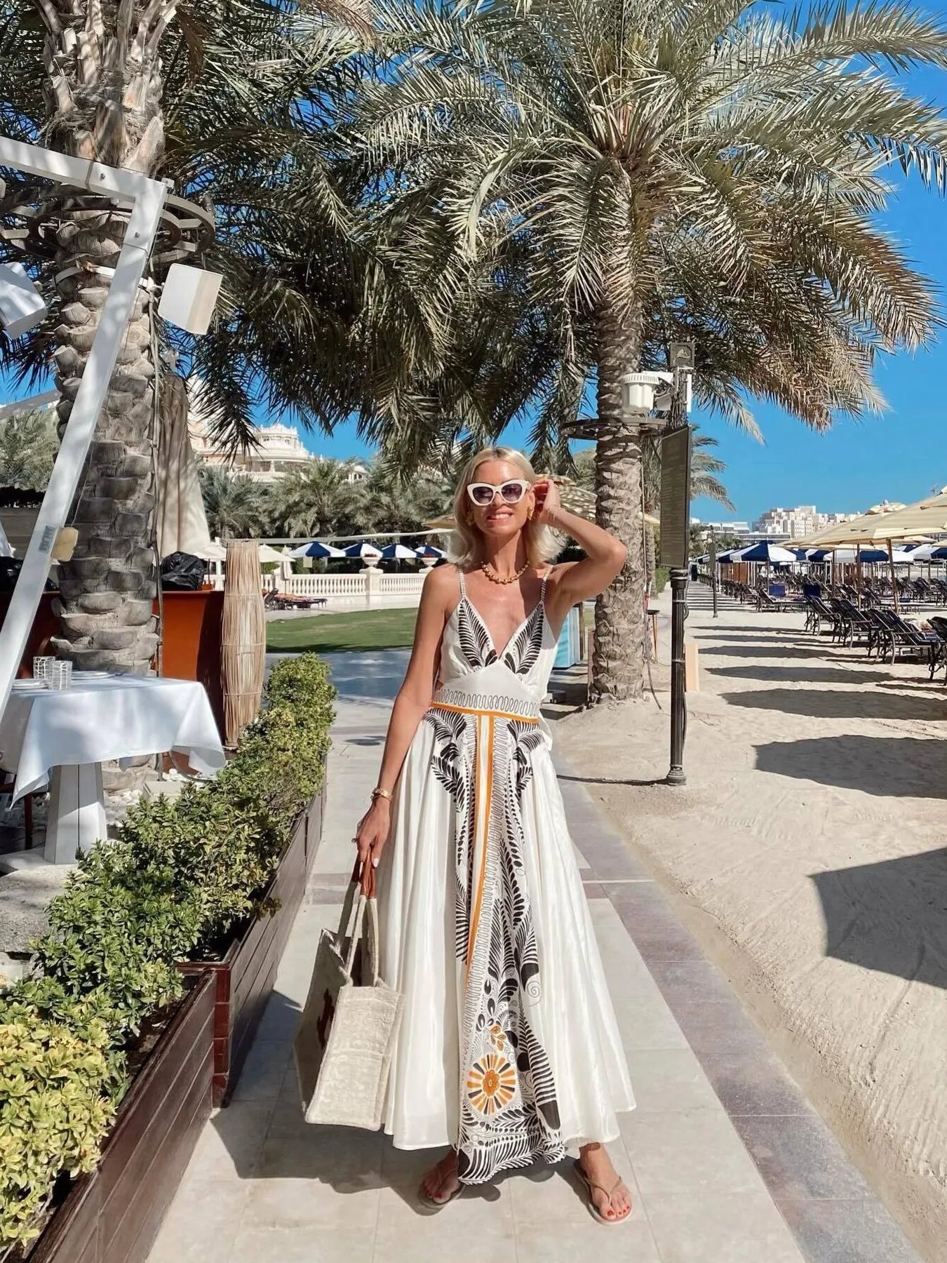 Cami Maxi Dress Apricot Leaf Printed V-Neck Cutout Backless Crisscross 7a5b4caf4af24ace8ba83433b248035f-Max-Origin Trendsi