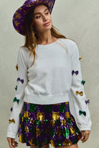 SO ME Sweater Knit Top Mardi Gras Glitter Bow Ribbon Ivory 80b1a06c6b074b8b94d74db10a5bc984-Max-Origin Trendsi