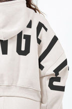 American Bazi Beige Cropped Hoodie Women's Letter Graphic Long Sleeve Top 826e7a38-7a86-474b-8219-fb774e82139e-Min Trendsi