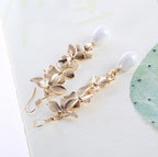 Alloy Flower Earrings Synthetic Pearl Pendant 9K gold-plated Fashion Jewelry 82df7821-4723-419d-9519-78afbadade16-Max Trendsi