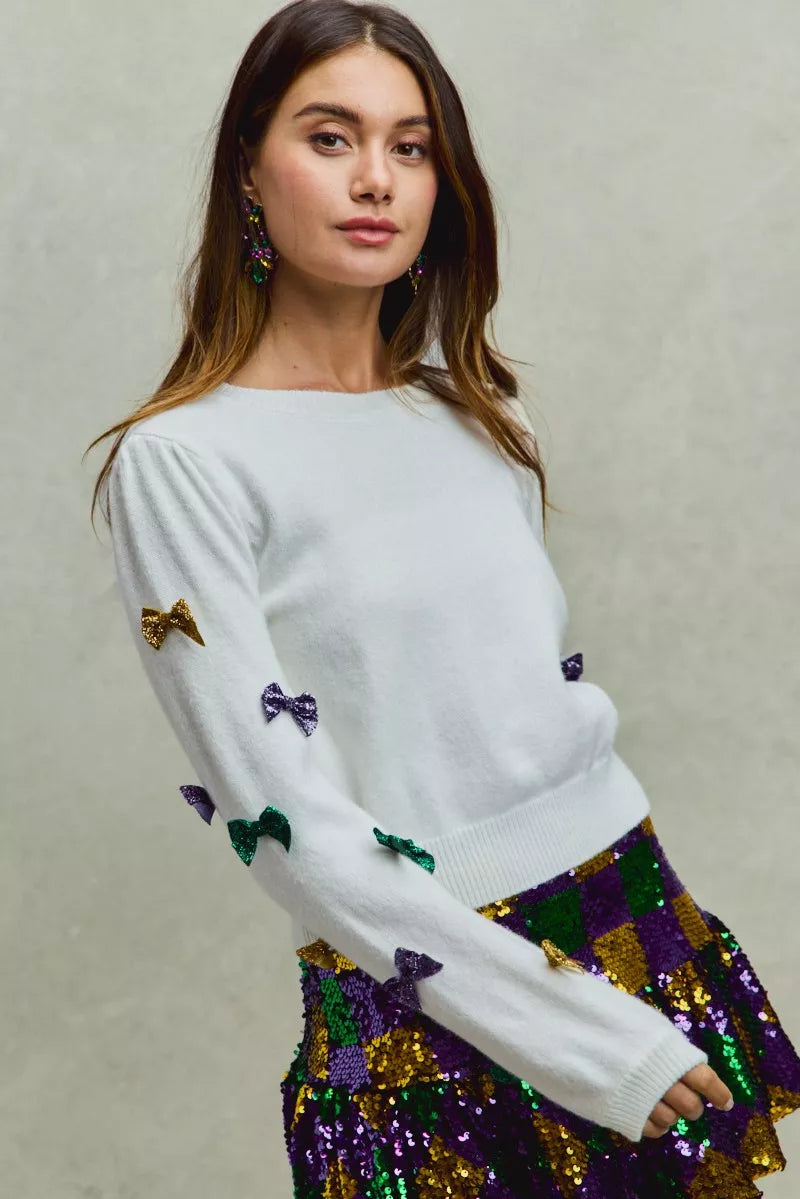 SO ME Sweater Knit Top Mardi Gras Glitter Bow Ribbon Ivory 833f6f71453843faa517ba11f5246fc9-Max-Origin Trendsi