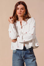 SO ME Women Blouse Front Tie Heart Embroidered Top With Puff Long Sleeve 85a13a0f404a4ea38d9c9f70f57bc8fc-Max-Origin Trendsi